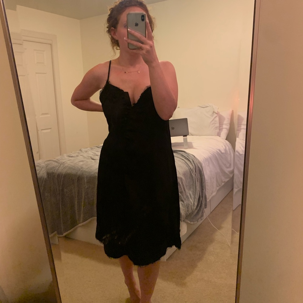 Black slip dress with lace detail